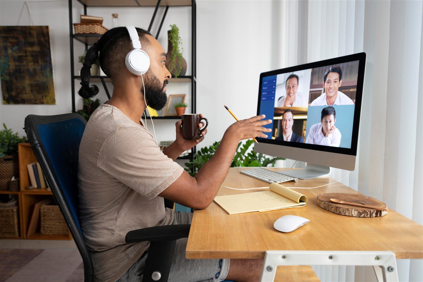 Team member collaborating with colleagues over a video call